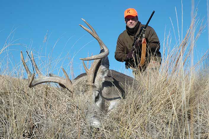 Open-country still-hunters can expect success at any time. This South Dakota buck fell at noon.