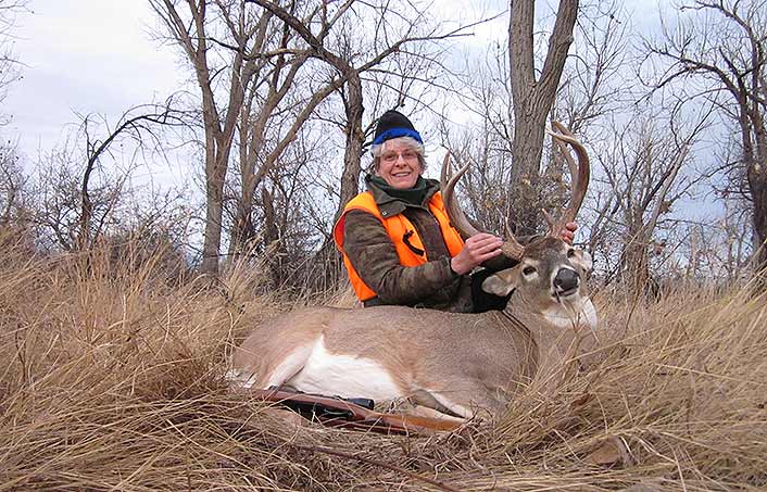 Even the .243 Winchester, which some hunters claim isn’t “fully adequate” for deer, will drop big whitetail bucks right there with shoulder/spine shots. Eileen Clarke dropped the biggest-bodied buck she’s ever taken with one 100-grain Nosler Partition, using exactly that placement.