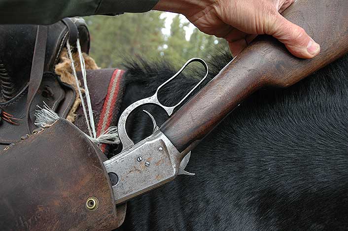 Short, slab-sided lever-actions with straight grips make ideal saddle rifles. This 94 has seen hard use.